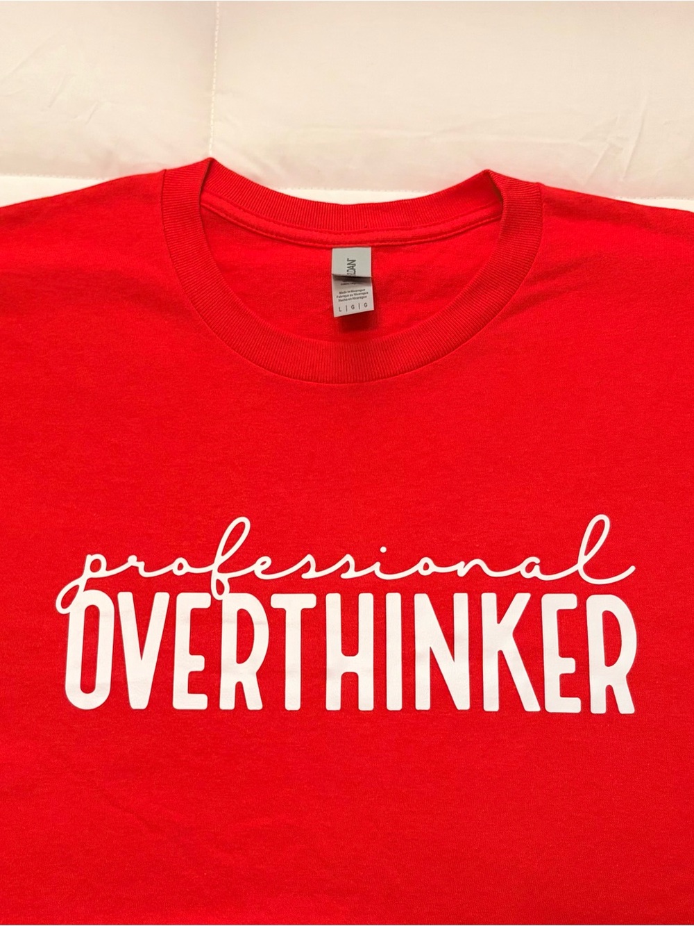 Gildan Red Men's Crewneck T-Shirt with "Professional Overthinker" White Graphic